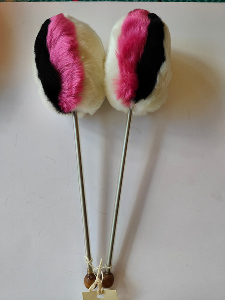 White with black and pink tenor drum beater